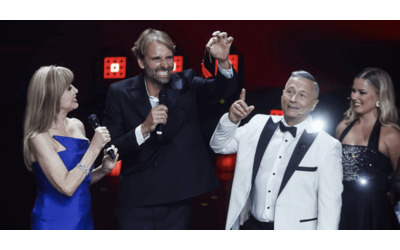 Ballando con Le Stelle le pagelle della prima serata le opinioni della giuria su Marcella Bella 4 Massimiliano Rosolino supplente precario 5 I voti