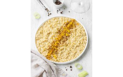 Risotto alla bottarga con crema di porri sette pepi e scorza di limone